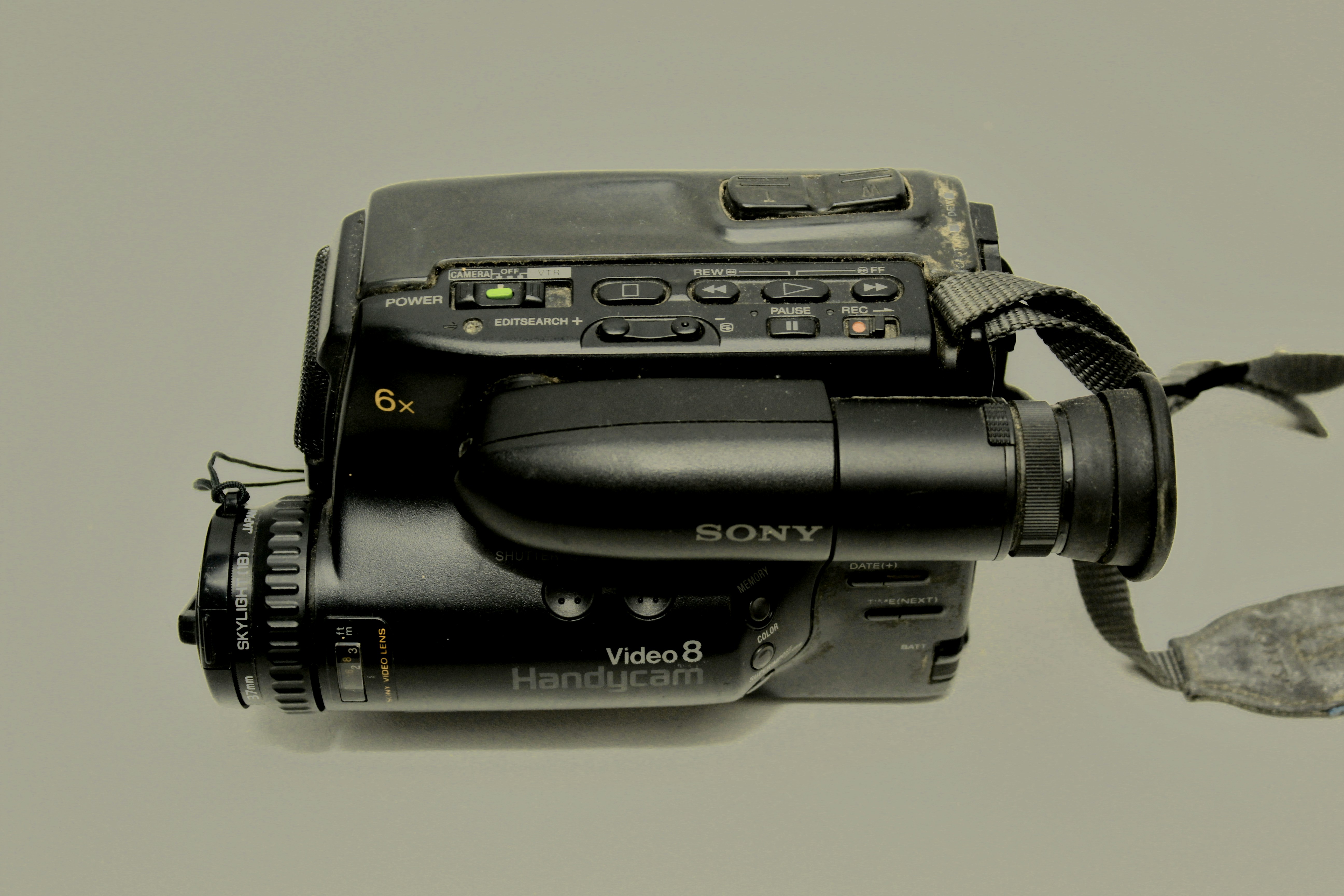 An old camcorder and VHS tapes